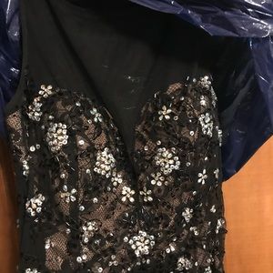 Black prom dress with mesh top and sparkles.